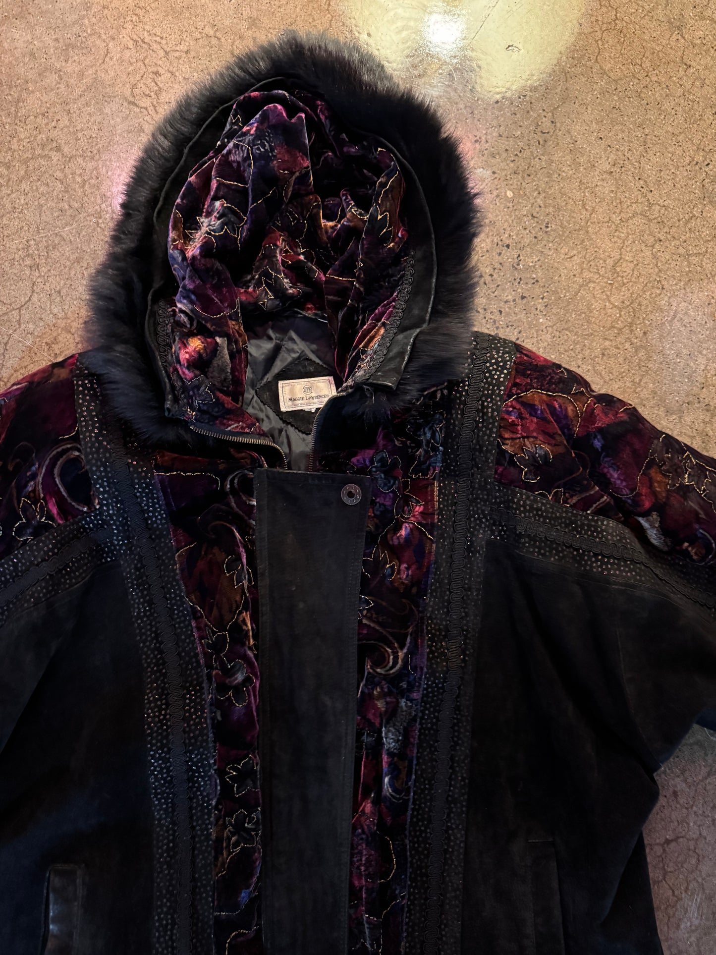 Vintage black leather and velvet jacket with fox fur trim hood, front view